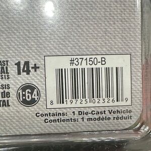 Norman Rockwell Die-Cast Vehicle Packaging with Gray and Black